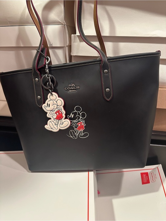 Coach Handbags - Coach Black Leather Tote with Mickey Character Charm